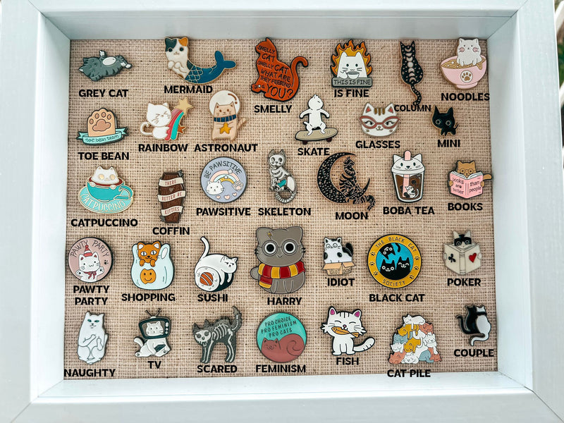 Metal pins for pet lovers.